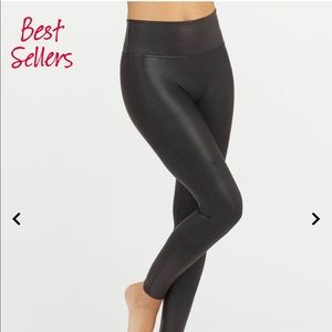 Black SPANX have never been wore. I cut the tags off before trying it on.